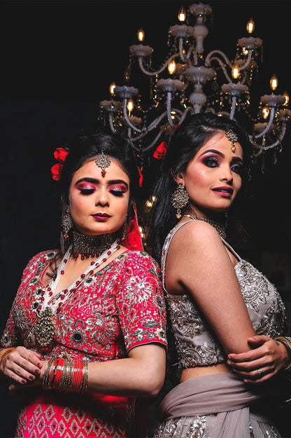 Radiant Red Bridal Lehenga Choli with Intricate Silver Embroidery