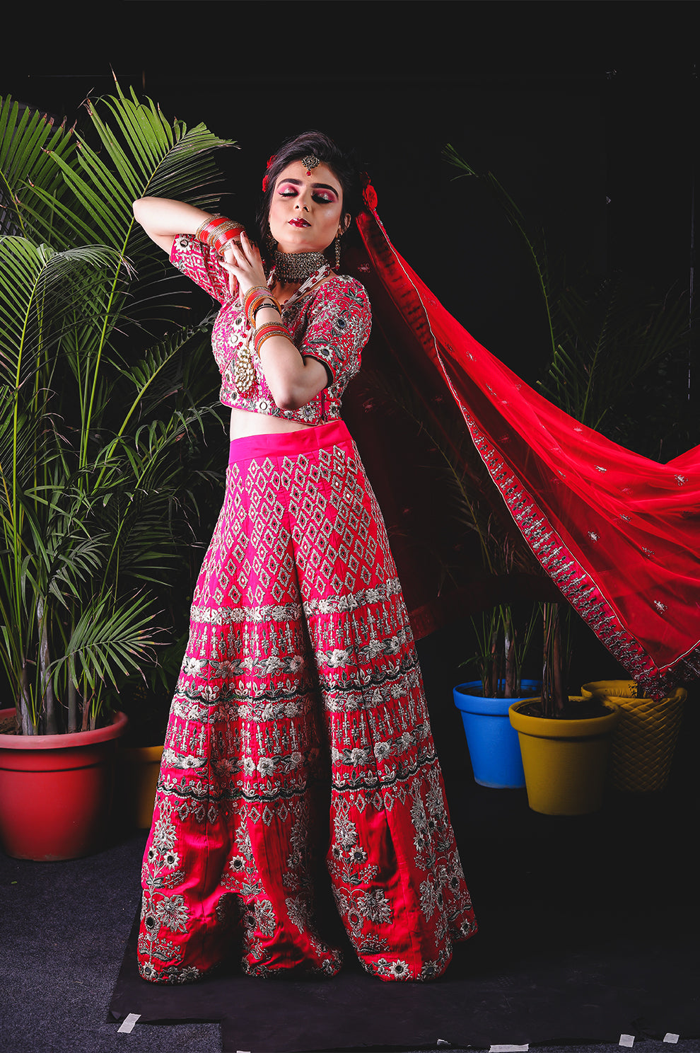 Radiant Red Bridal Lehenga Choli with Intricate Silver Embroidery
