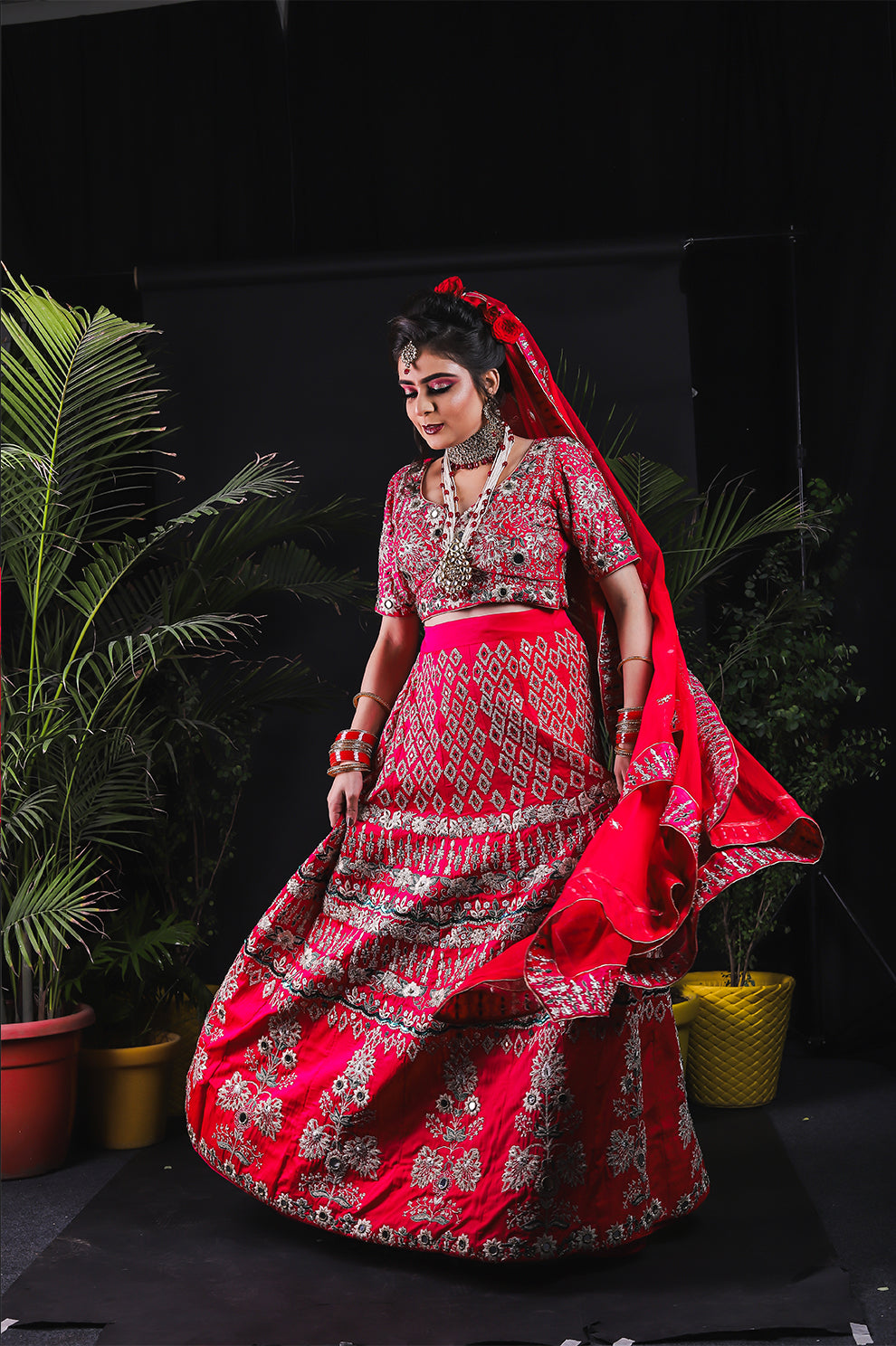 Radiant Red Bridal Lehenga Choli with Intricate Silver Embroidery