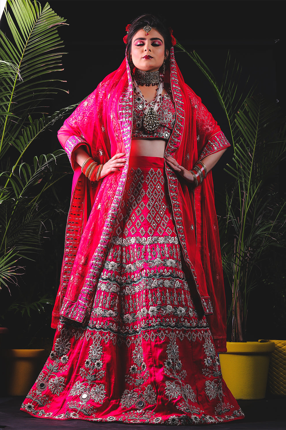 Radiant Red Bridal Lehenga Choli with Intricate Silver Embroidery